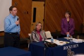 Sully Supervisor Michael Frey welcomes attendees to the annual Sully Budget Town hall meeting, to his right are Susan Datta, Director Fairfax County Department of Management and Budget, and Sully School Board Member Kathy Smith