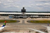 Dulles terminal, the old control tower and passenger shuttles